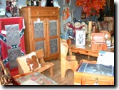 Country wood furniture and  oak furniture readily available to dress up your log cabin.